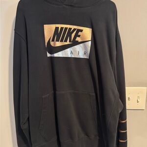 Nike Air Black Hoodie with Gold and Silver Accents